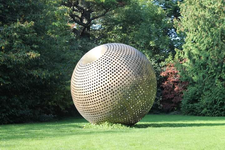 Convergence, bronze spherical sculpture by Brian King