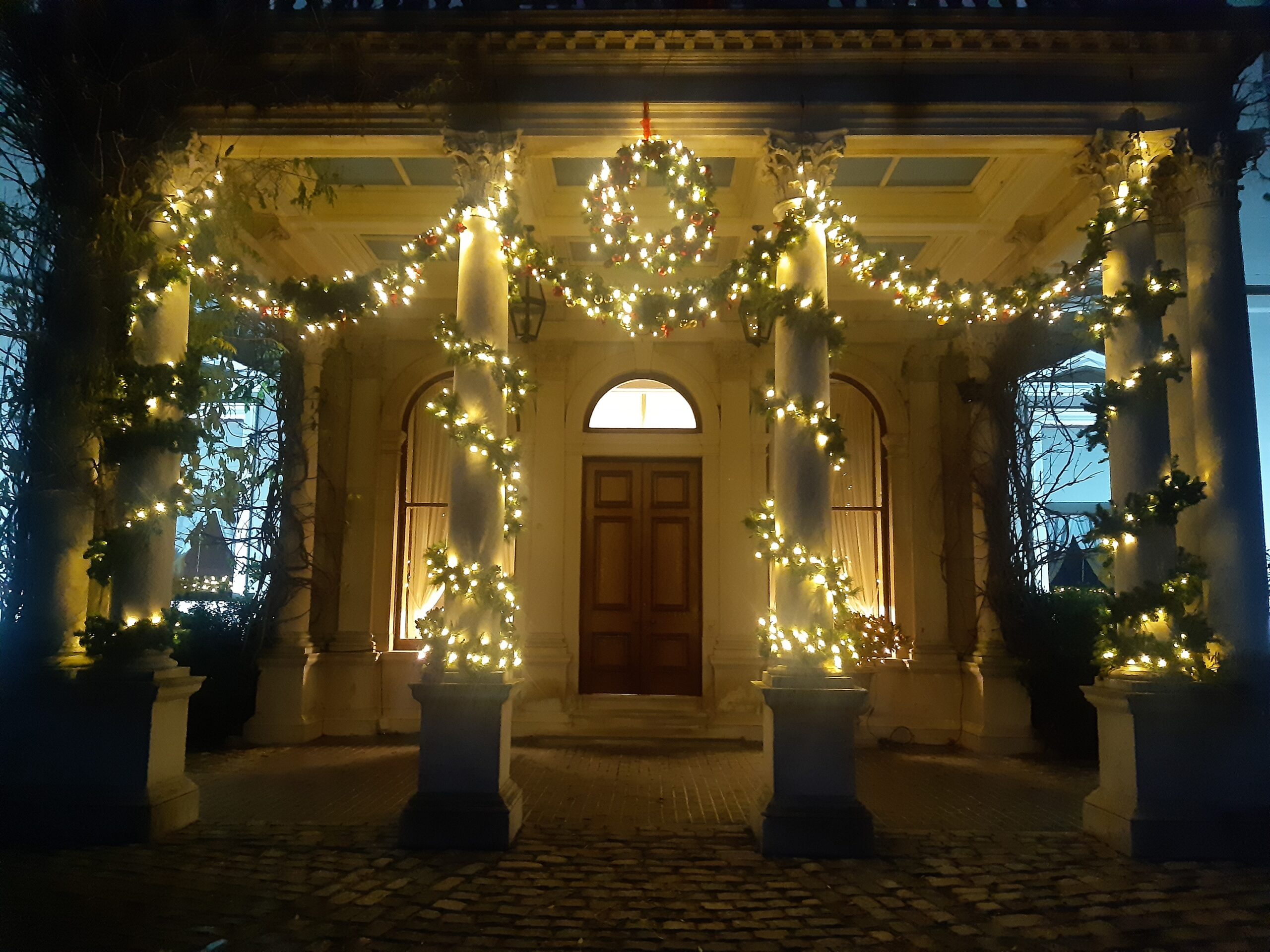 Christmas lights decorating the pillars of the porte cochère at Farmleigh House